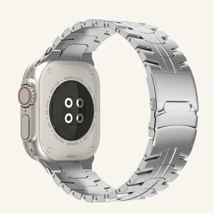 Bracelet Apple Watch — finitions argent, noir, gris titane et orange