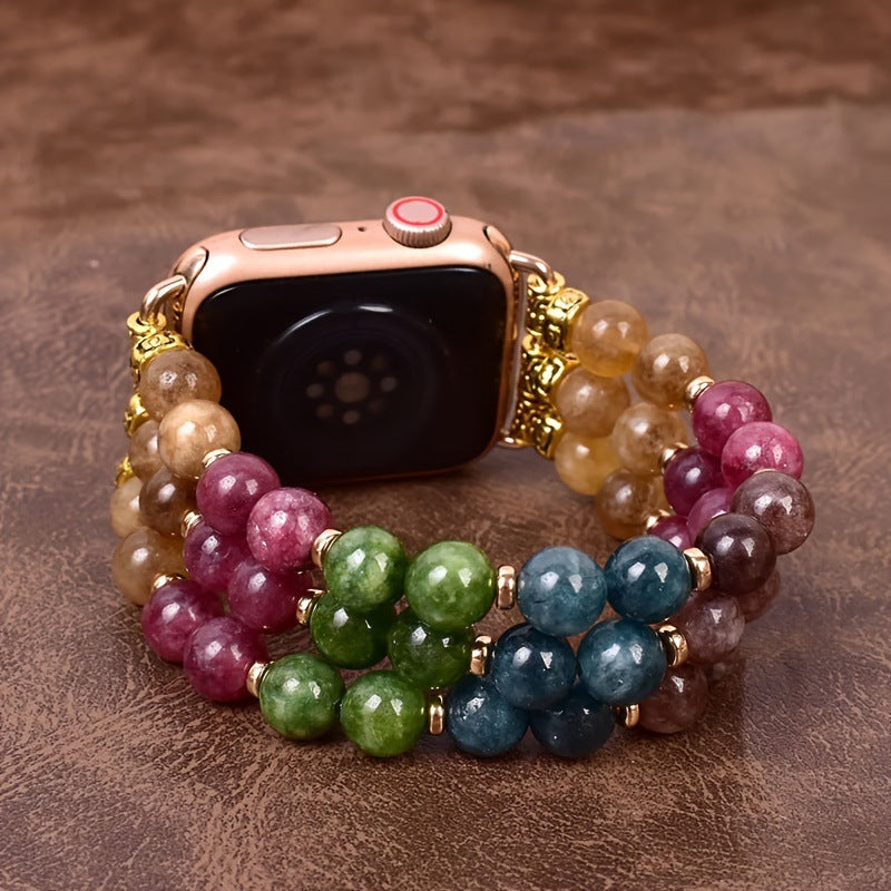 Gros plan sur les perles de tourmaline du bracelet Apple Watch